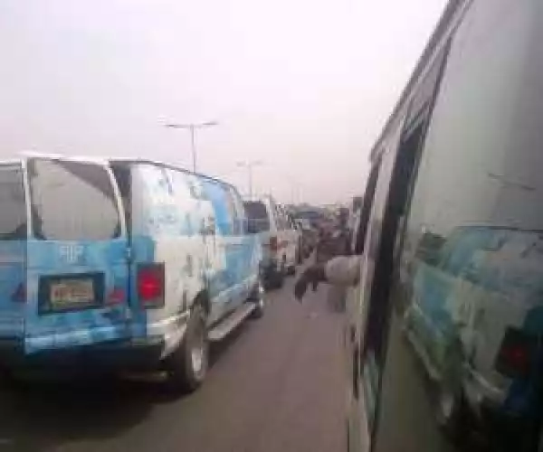 Photos: Dangote Truck Runs Into Cars, Burst Into Flames In Asaba, Many Feared Dead